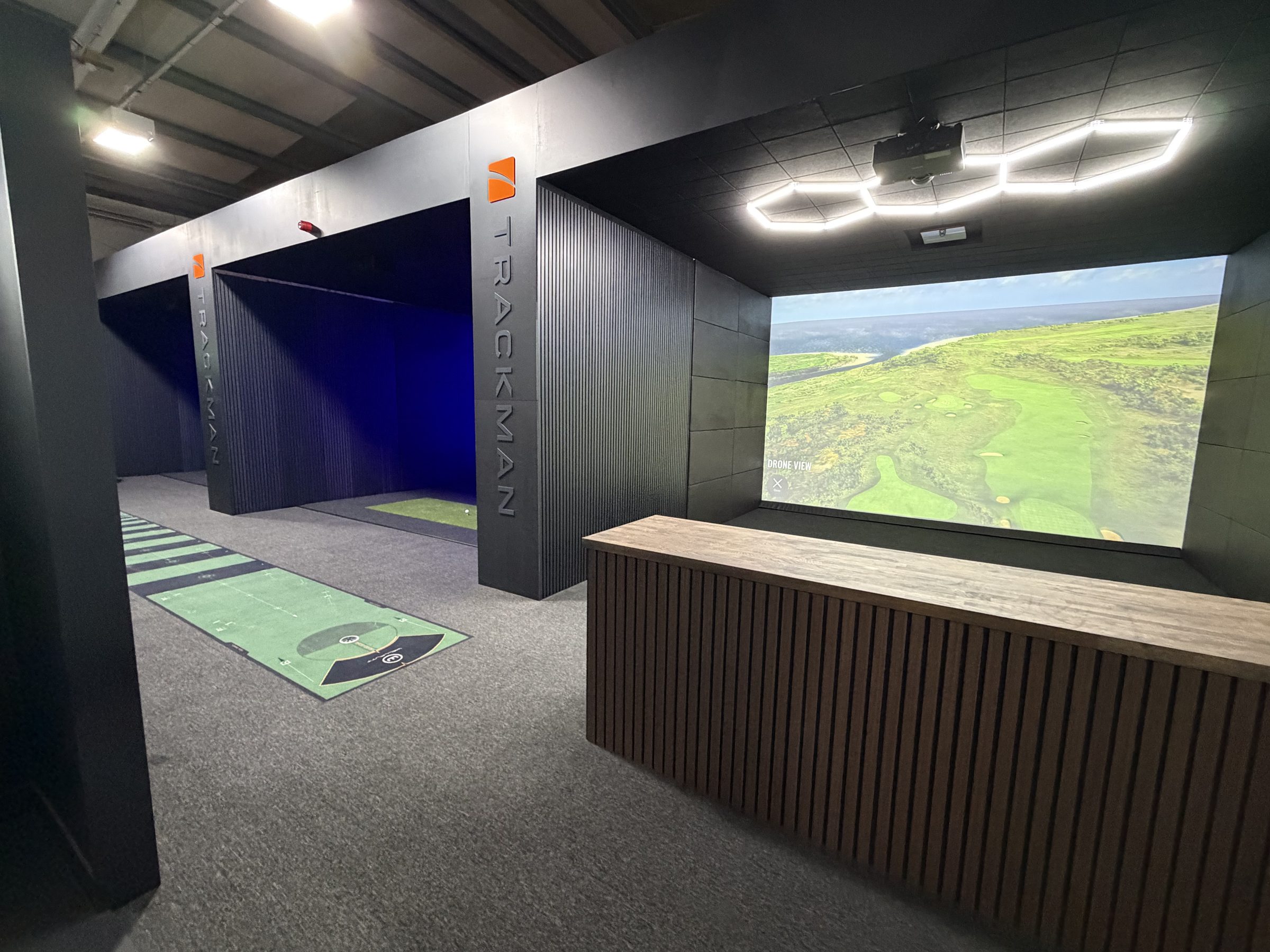 PGP Golf Studio — simulator bays and front desk